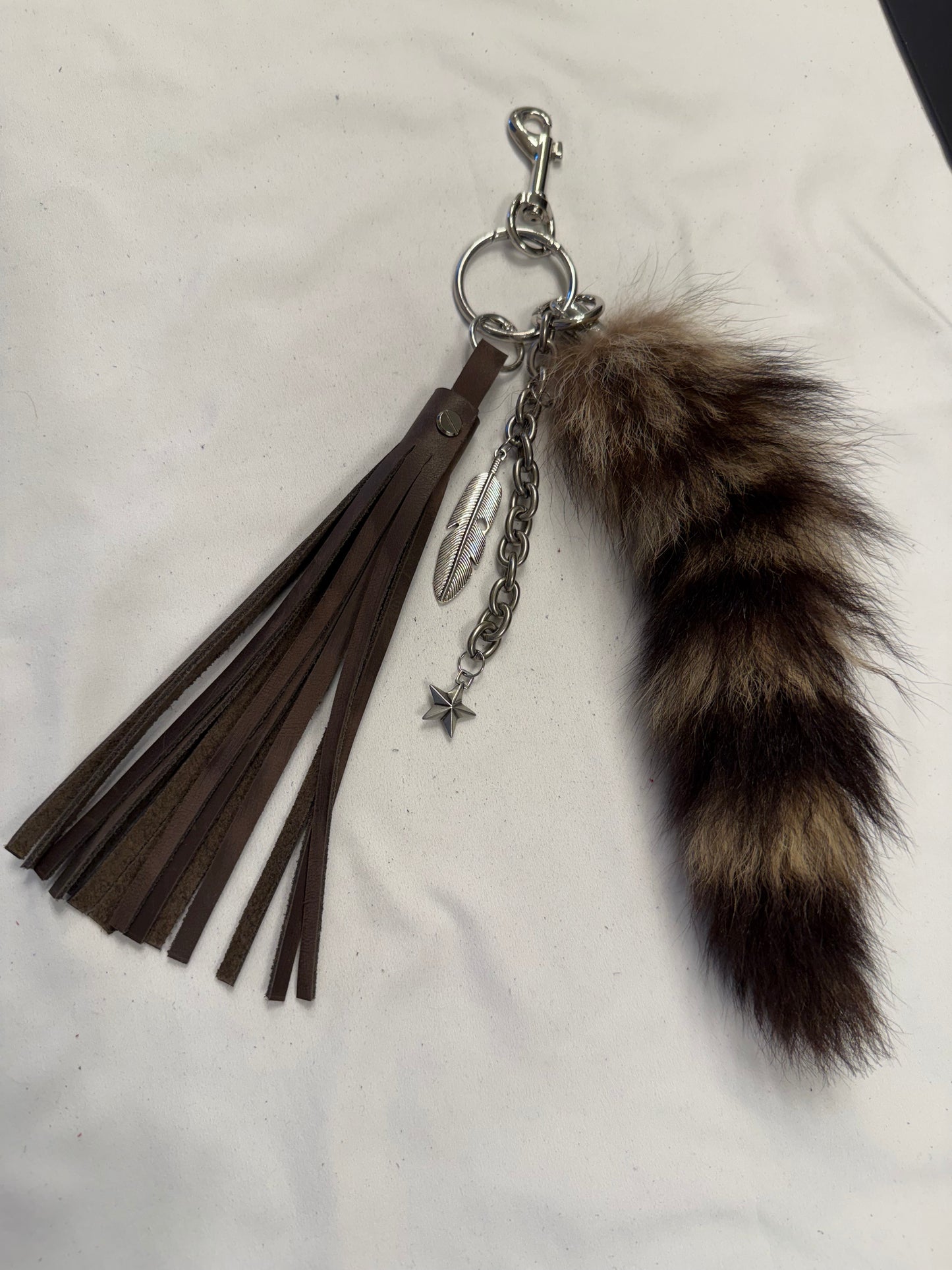 Cluster Bag Charm with Faux Fur Raccoon Tail, Handcut Leather Distressed Tassel, Gold Chain with Charms (the star is a Coach charm)