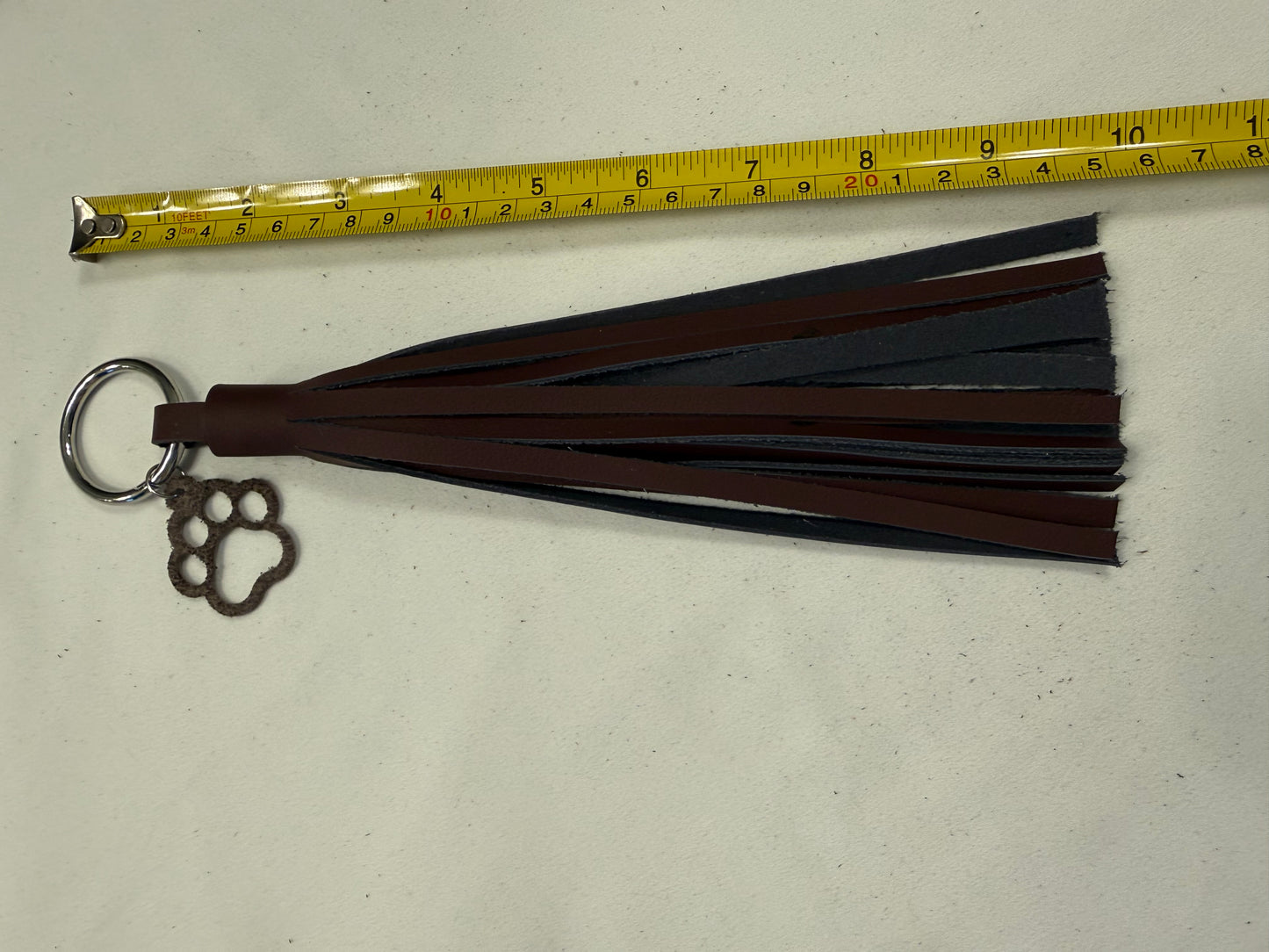 Handcut Two-Tone Leather Tassel with Leather Paw Print Charm