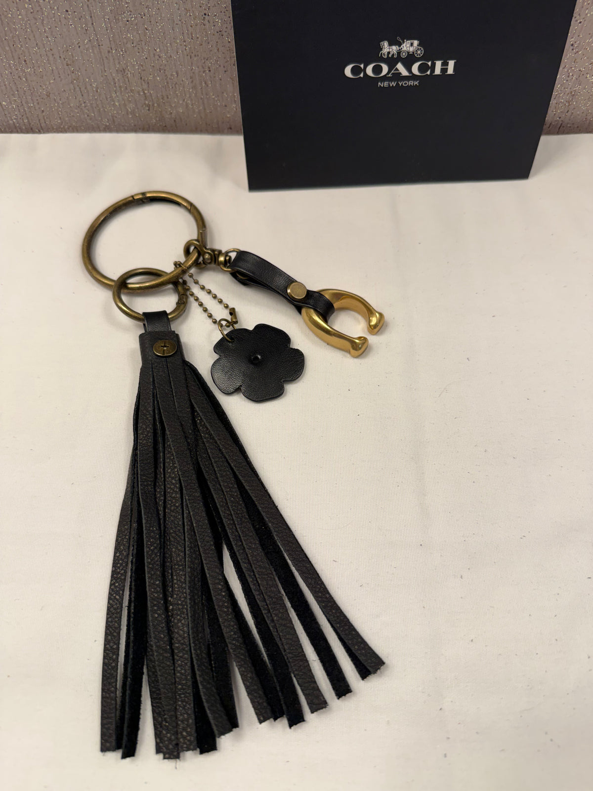 Ships 10.13.26 Bag Charm Cluster with a Repurposed Coach C from Tic Tac Toe Board, Coach Tea Rose, and Handmade Leather Tassel Bag Charm Cluster