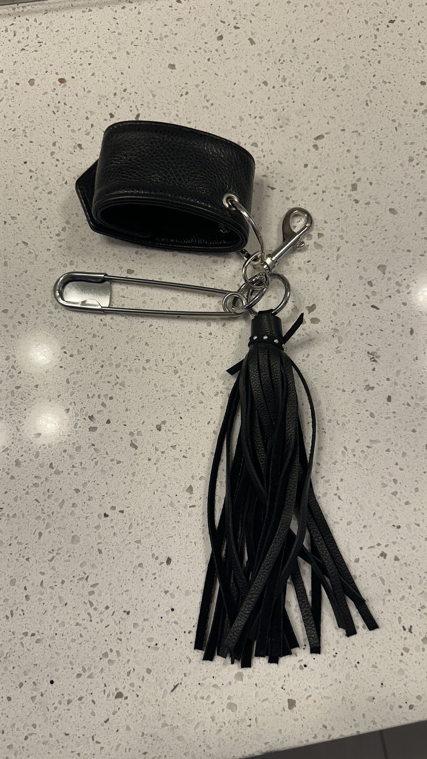 Moto-Inspired Bag Charm Cluster with Repurposed Cuff from a Coach Jacket