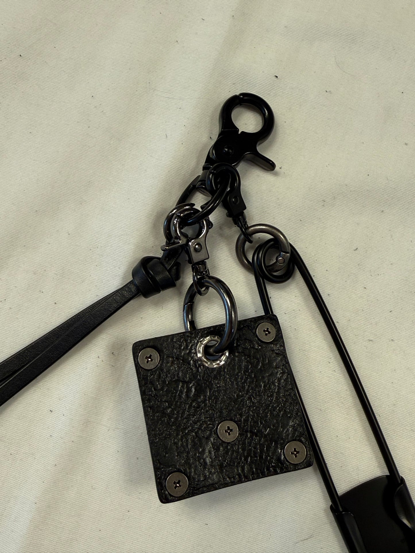 Upcrafted Bag Charm Cluster | Repurposed Leather Cord/Tassel, Skull Charm & XL Safety Pin