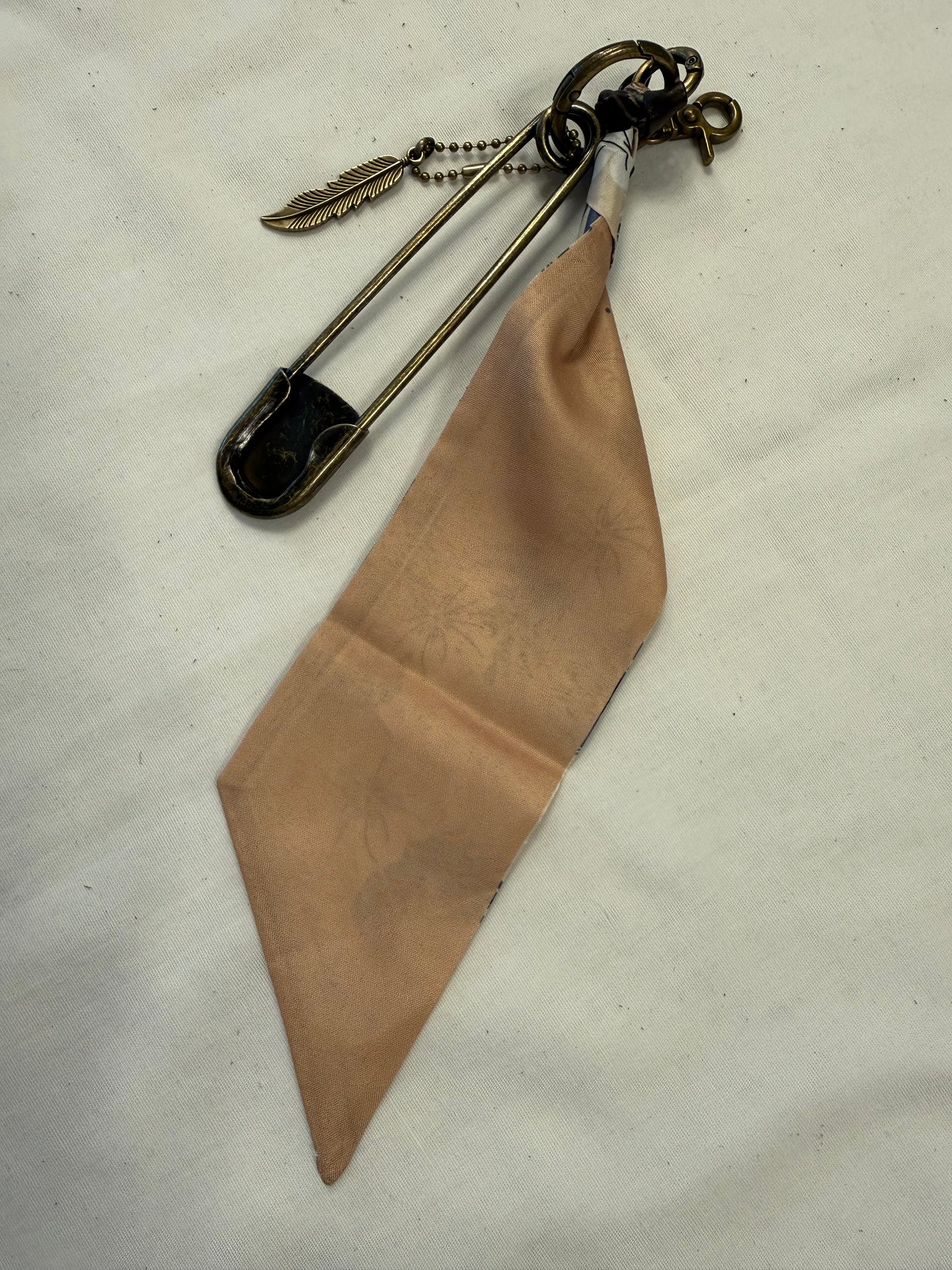 Tan & Blue Floral Scarf, Safety Pin, and Feather Bag Charm Cluster on Antique Brass Tone Hardware