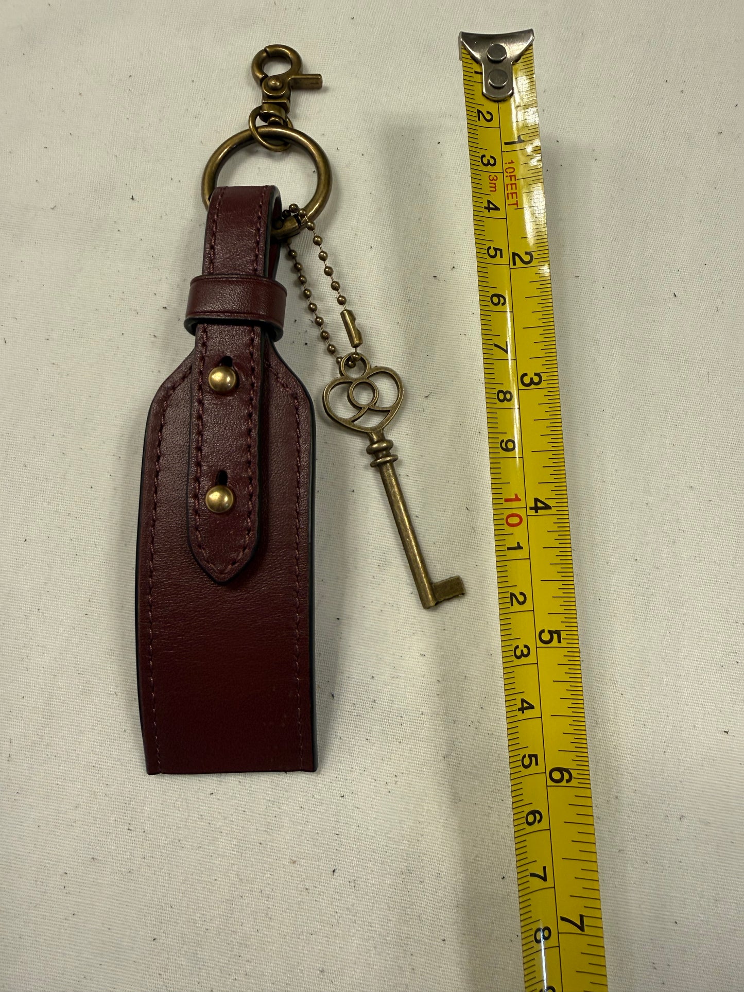 Repurposed Coach Beat Bag Strap & Antique Key Bag Charm