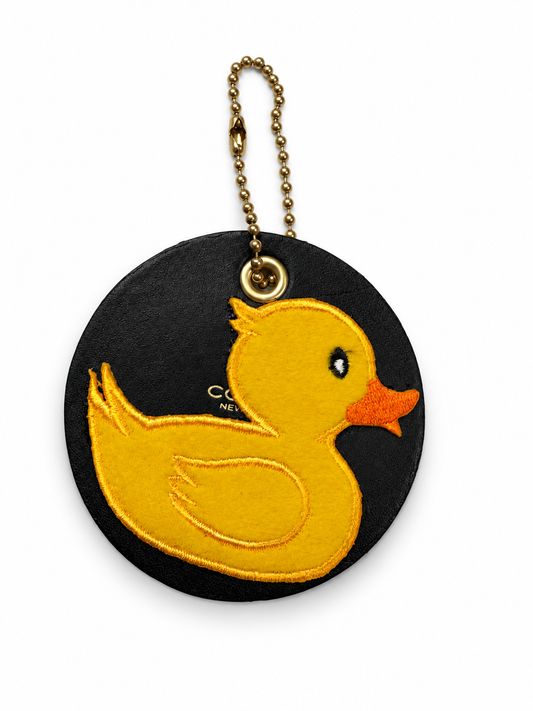 Repurposed Piece of a Coach Coaster Holder with a Rubber Ducky Patch Bag Charm