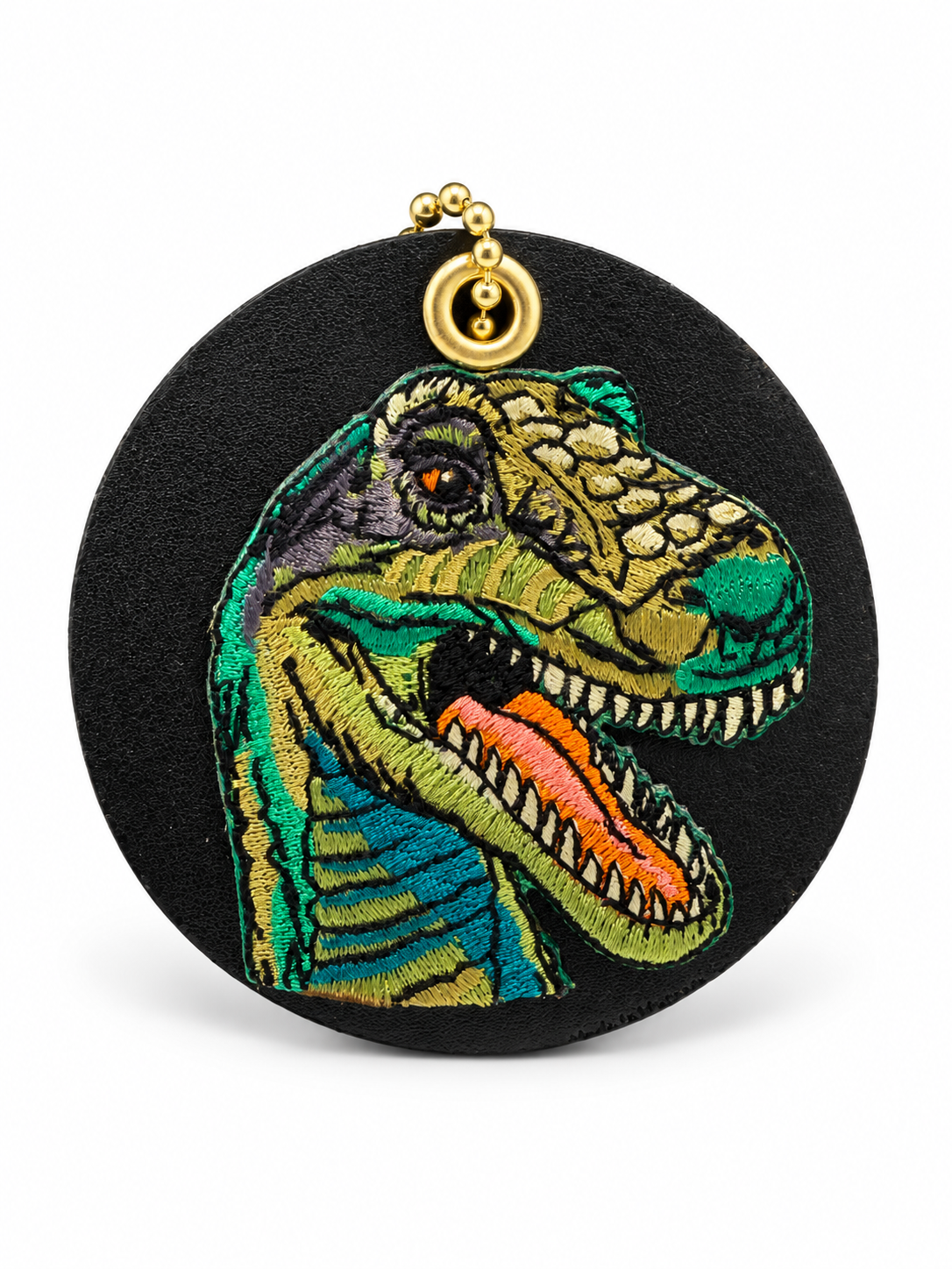 Repurposed Center of a Coach Coaster with Embroidered T-Rex Patch Bag Charm