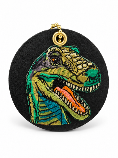 Repurposed Center of a Coach Coaster with Embroidered T-Rex Patch Bag Charm
