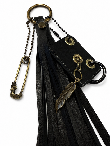 Vegan Leather Handmade Tassel with Repurposed Coach Tic Tac Toe Piece Riveted Charm and Skull Safety Pin Antique Brass Bag Charm