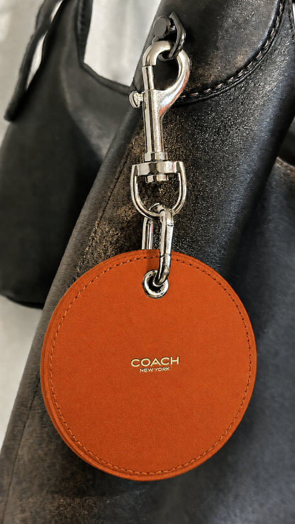 Repurposed Coach Coaster Bag Charm in Orange Leather with Chrome Skull