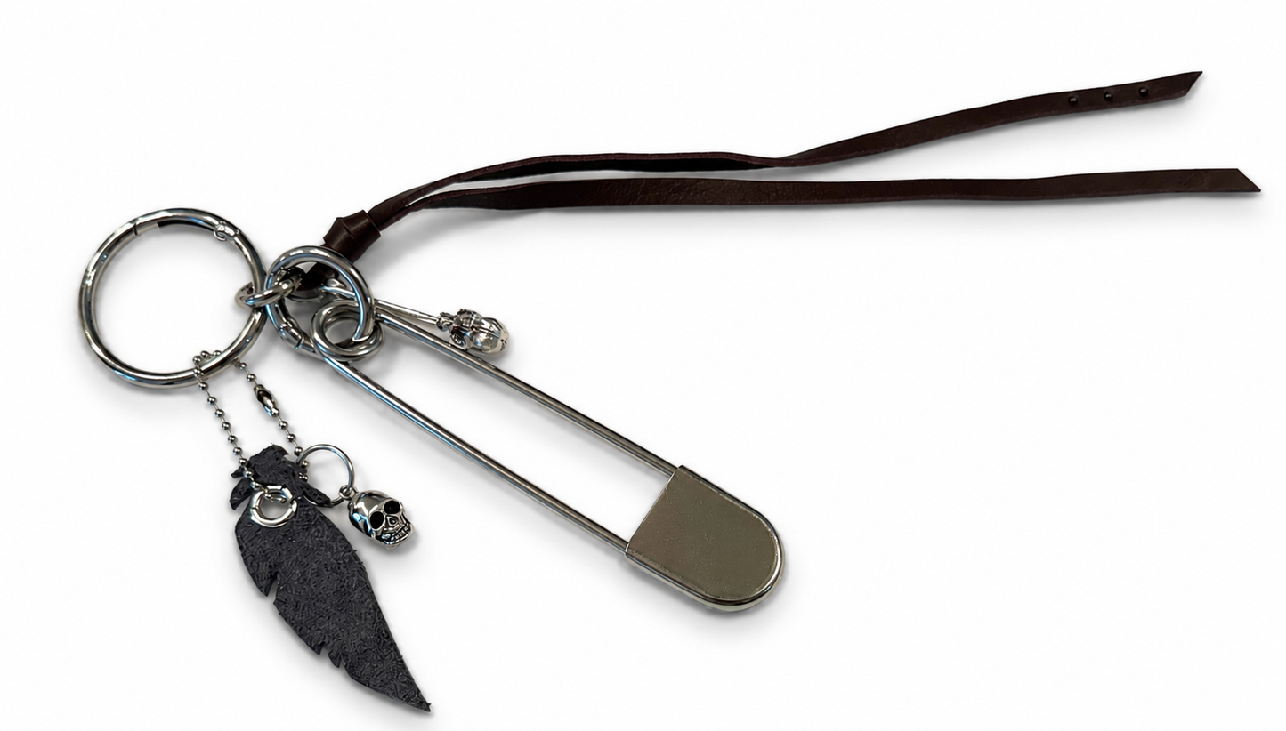 Bag Charm Cluster | Repurposed Coach Oxblood Leather Tie/Tassel, Dusty Blue Leather Feather & Skull Charms