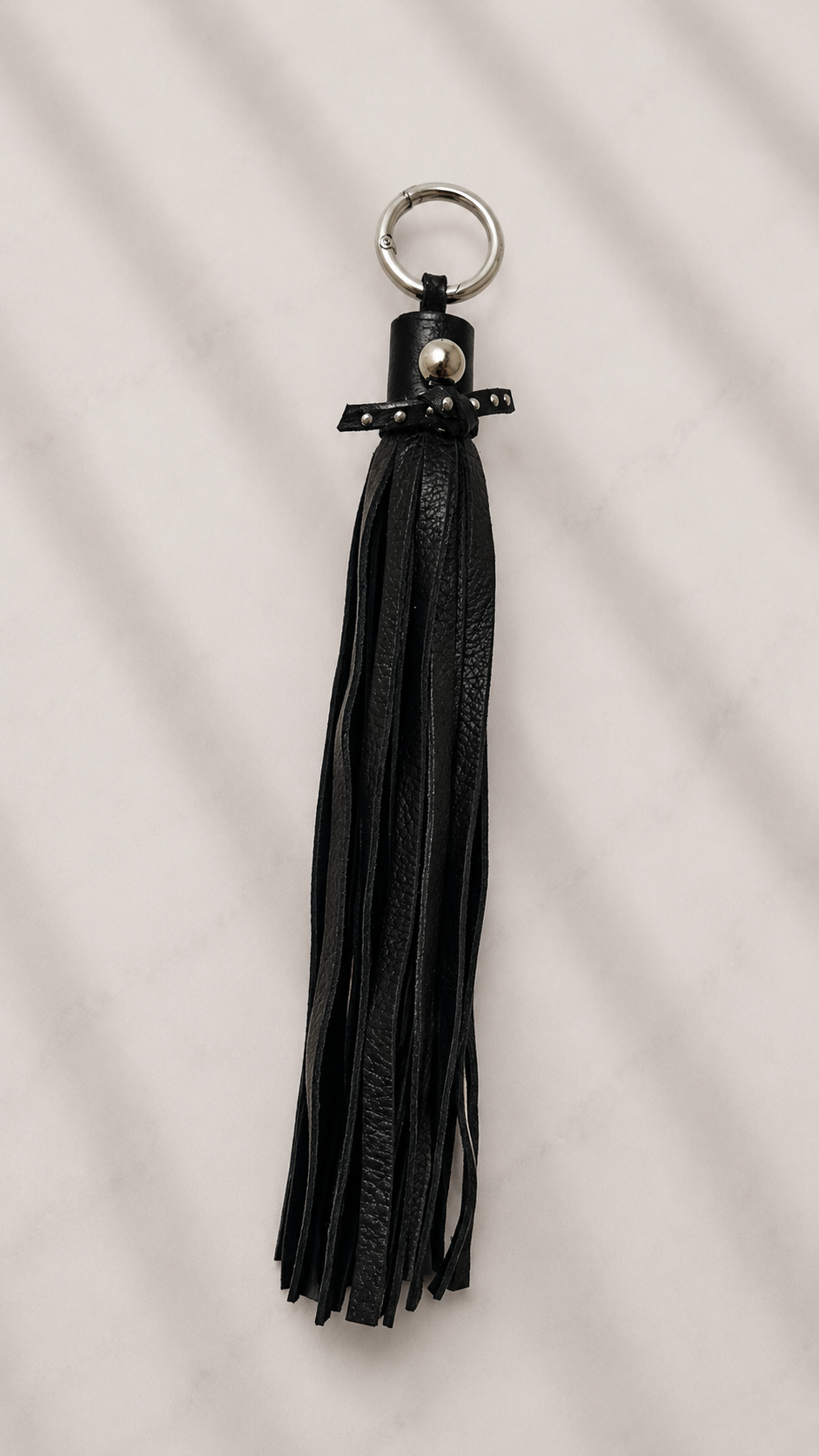 Pebbled Leather Black Tassel with Riveted Tie