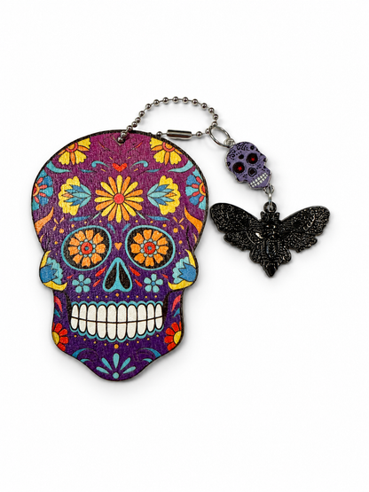 Purple Sugar Skull Embossed on Wood and Sugar Skull and Skull Moth Charm Bag Charm