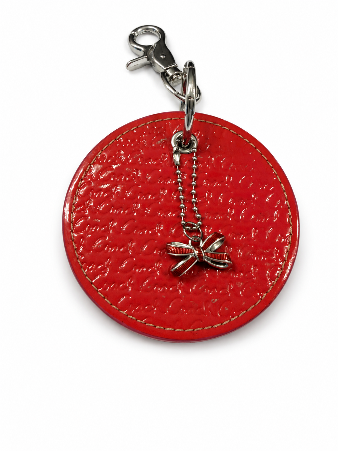 Repurposed Coach 1990s Coaster with Coach Bow Charm Bag Charm