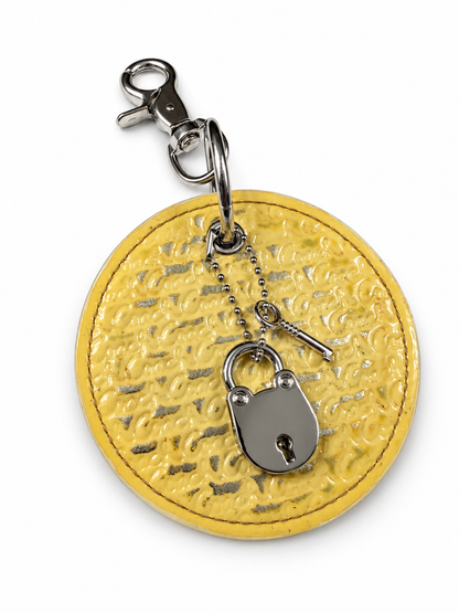 Repurposed Coach 1990s Coaster with Lock and Key Charm (works) Bag Charm