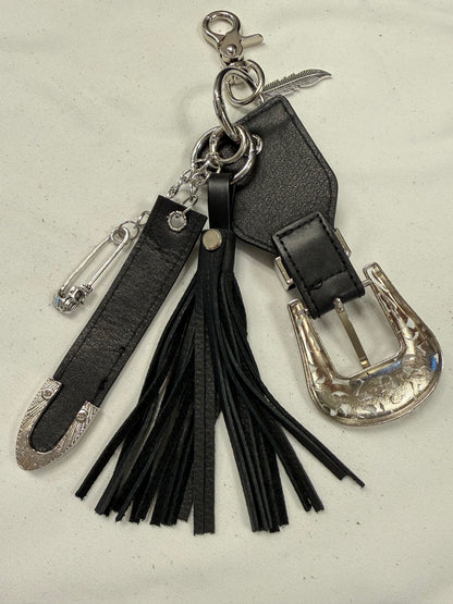 Repurposed Western Belt with Feather Charm and Skull Charm with Handmade Leather Tassel