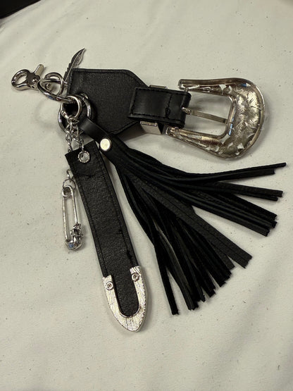 Repurposed Western Belt with Feather Charm and Skull Charm with Handmade Leather Tassel