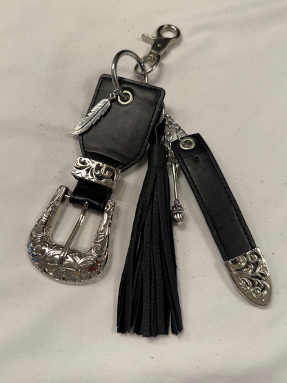 Repurposed Western Belt with Feather Charm and Skull Charm with Handmade Leather Tassel