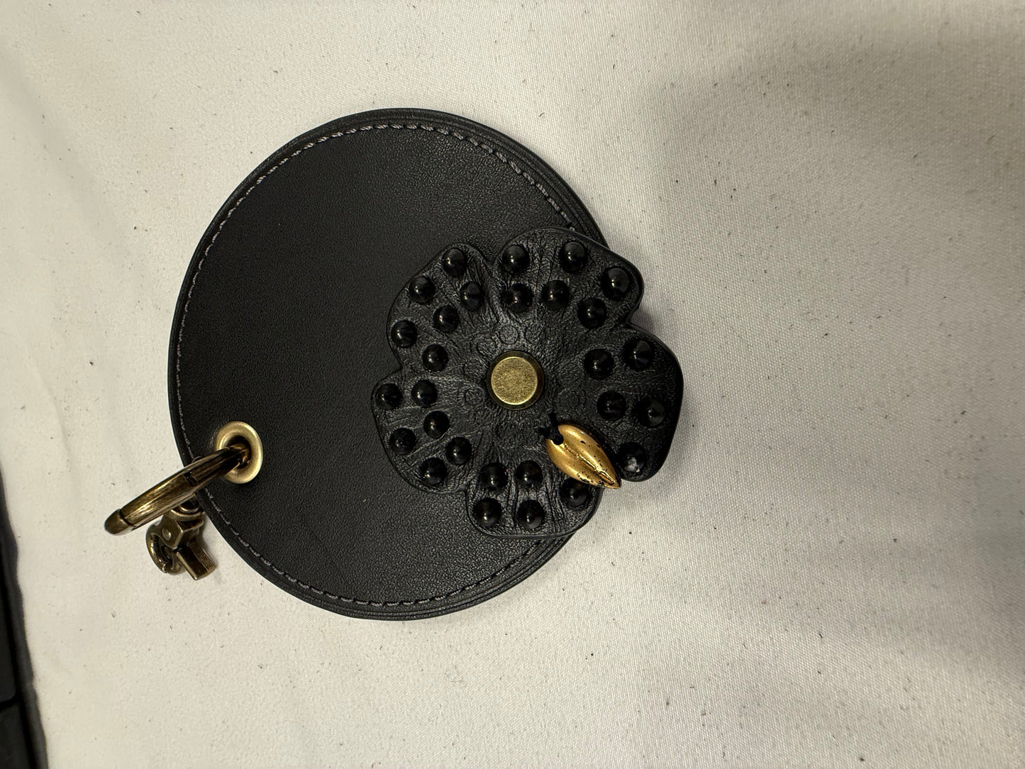 Repurposed Coach Coaster and Studded Tea Rose Bag Charm