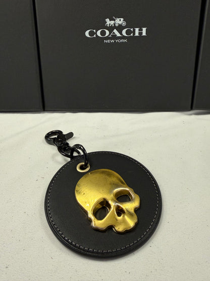 Repurposed Coach Coaster with Distressed Gold Tone Skull Bag Charm