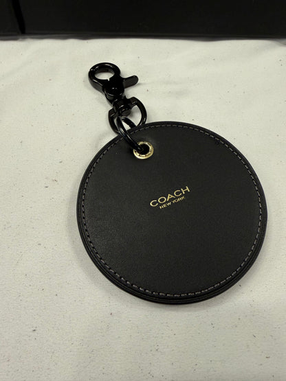 Repurposed Coach Coaster with Distressed Gold Tone Skull Bag Charm