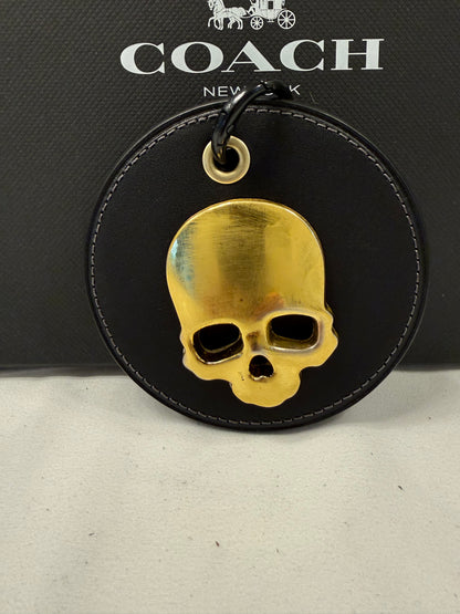 Repurposed Coach Coaster with Distressed Gold Tone Skull Bag Charm