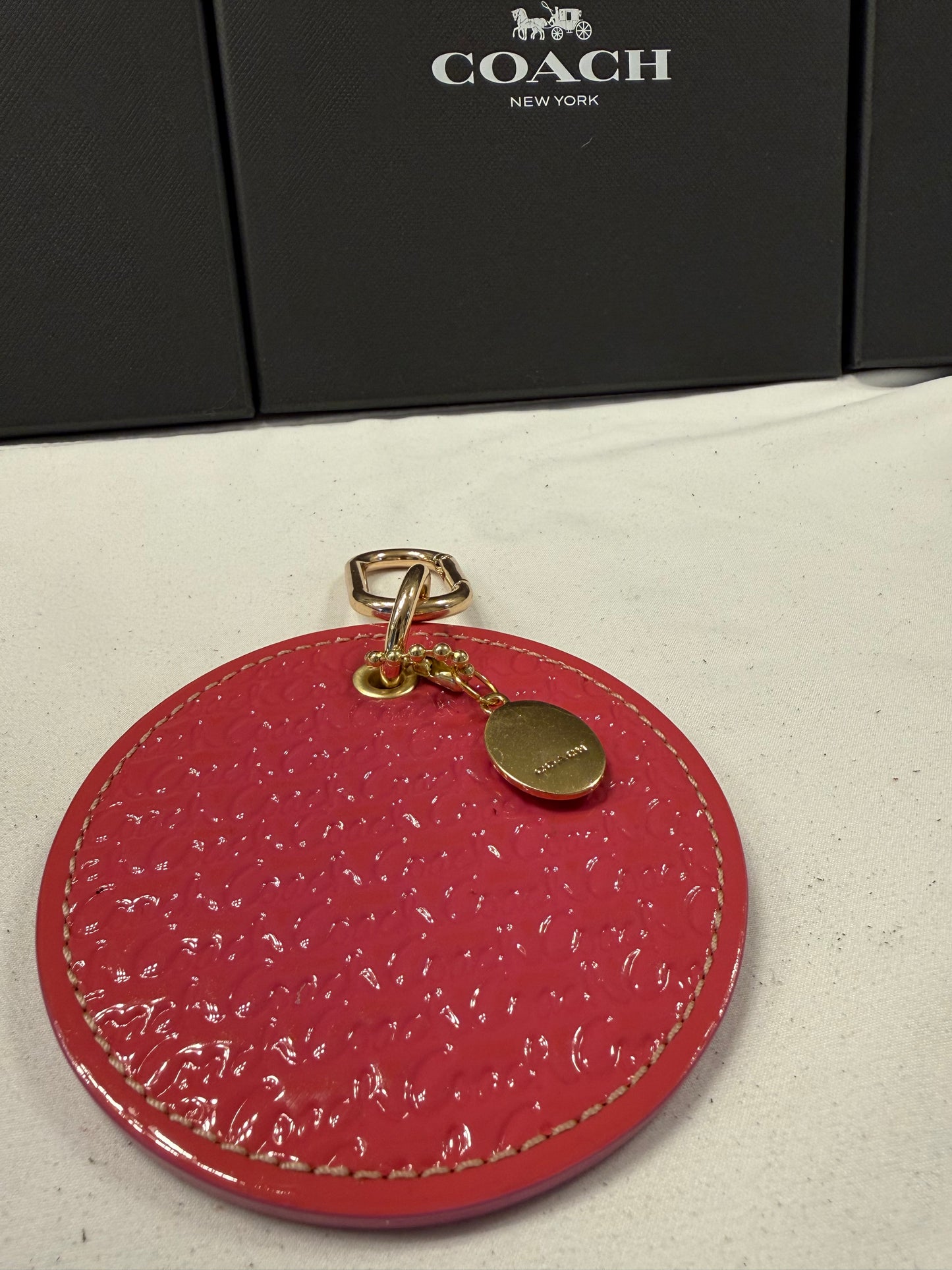Repurposed Coach 1990s Coaster with a Coach Cameo Charm from a Bracelet