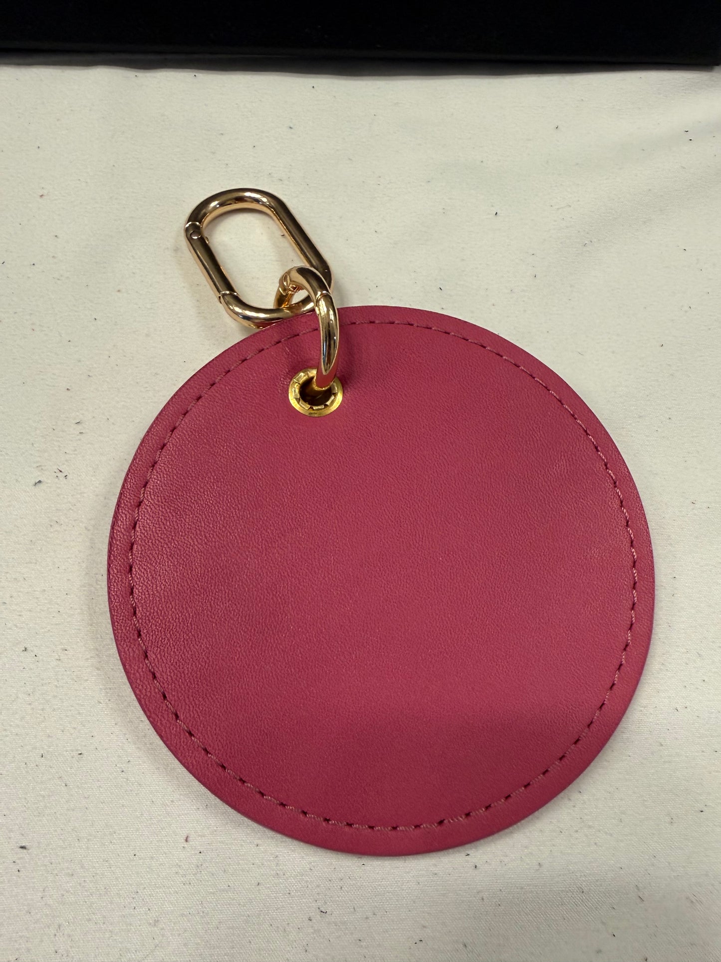 Repurposed Coach 1990s Coaster with a Coach Cameo Charm from a Bracelet