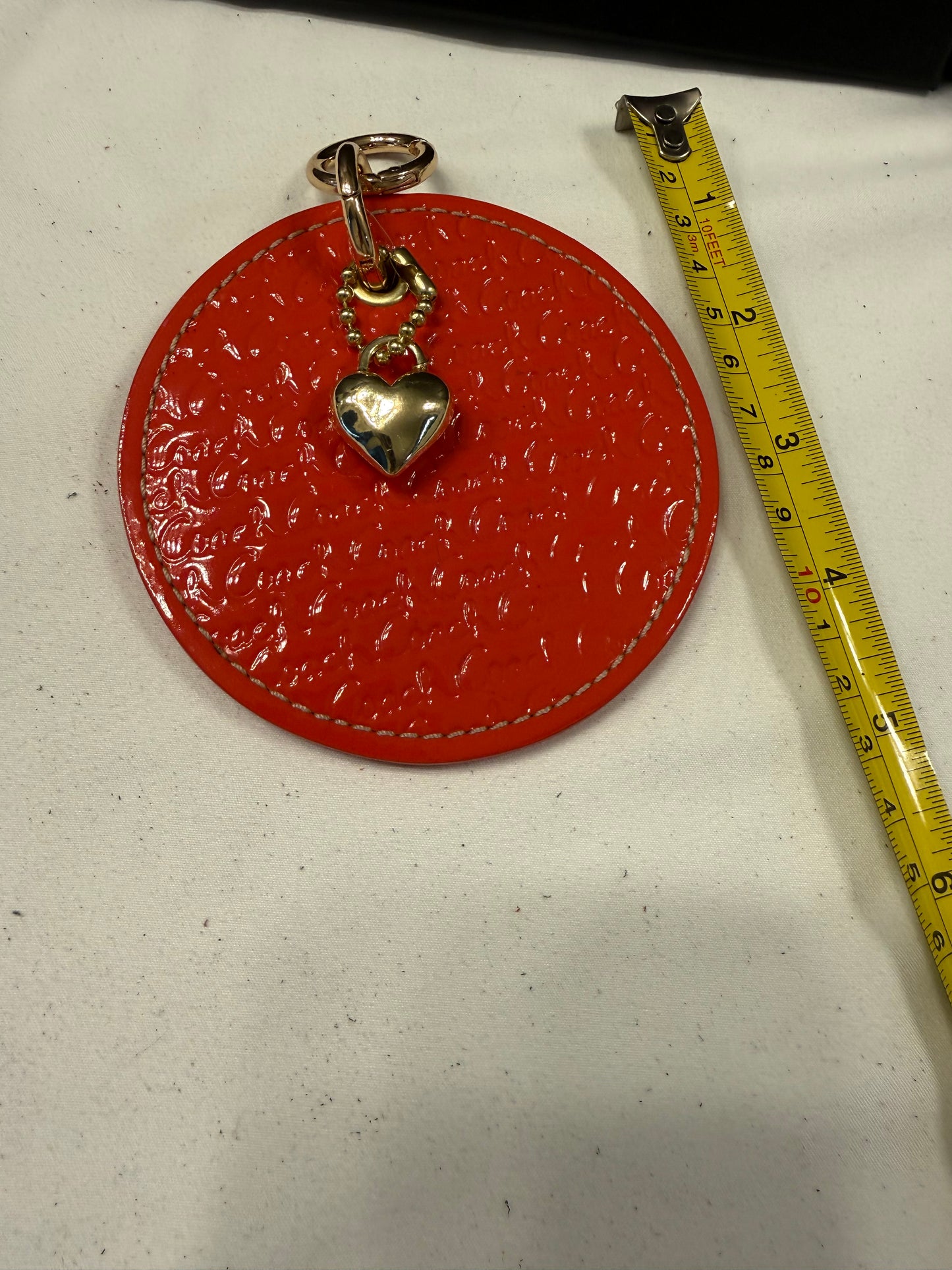 Repurposed 1990s Coach Coaster with Heart Charm-Bag Charm