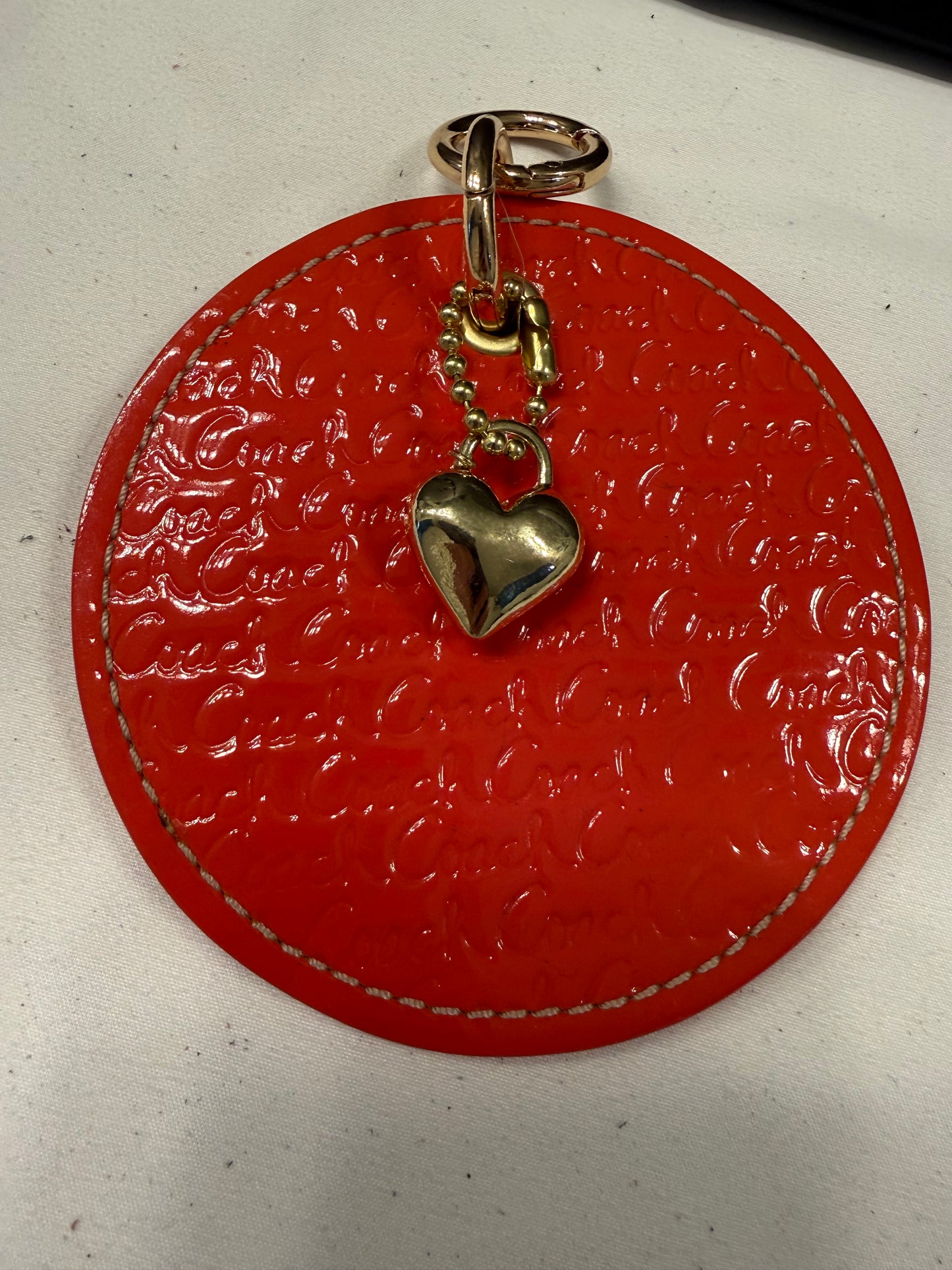 Repurposed 1990s Coach Coaster with Heart Charm-Bag Charm