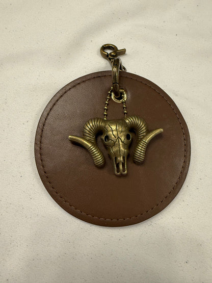 Repurposed 1990s Coach Coaster with Ram Charm- Bag Charm
