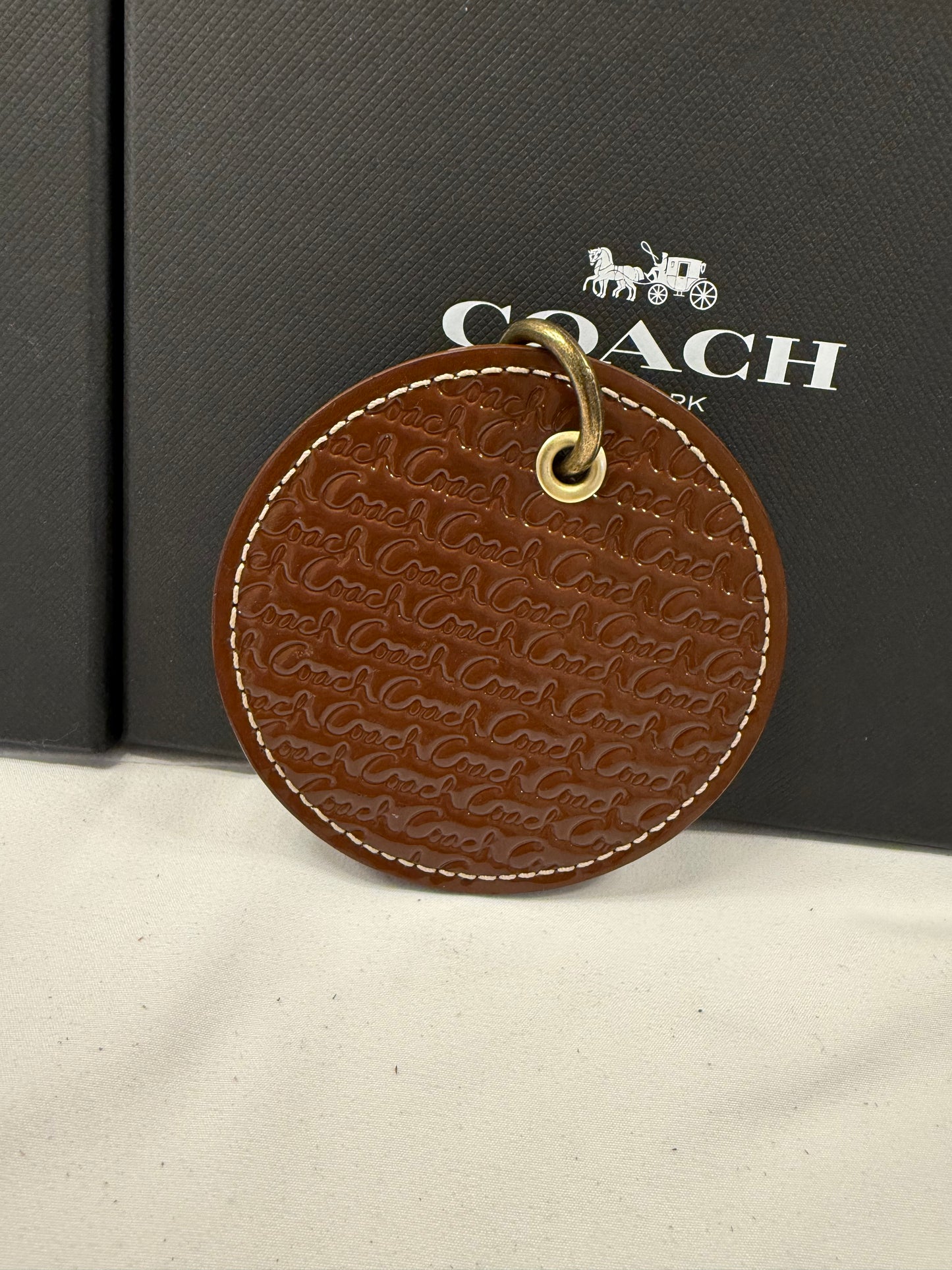 Repurposed 1990s Coach Coaster with Ram Charm- Bag Charm