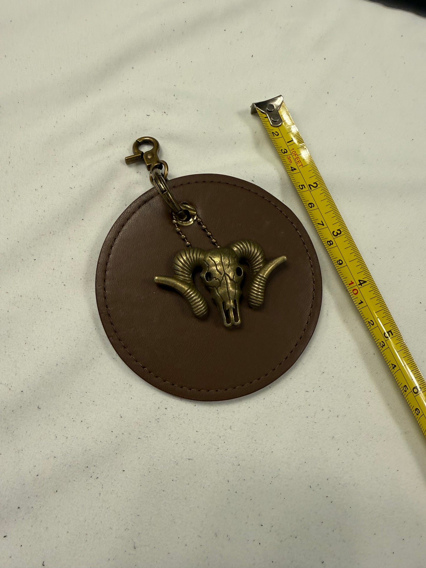 Repurposed 1990s Coach Coaster with Ram Charm- Bag Charm