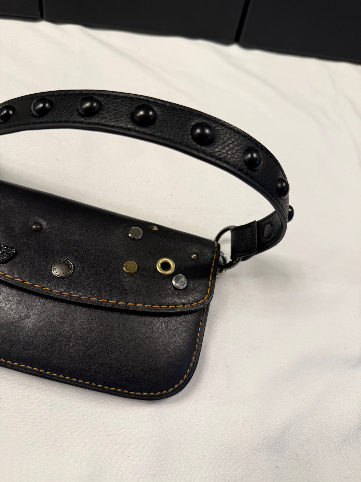 Upcrafted Coach Pouch with Stenciled Skull Moth, Rivets, Studded Handle, and Metal Mini Hangtag