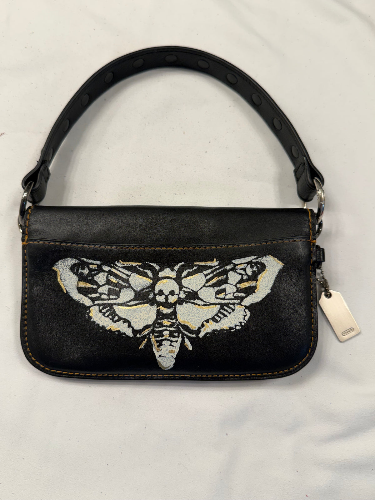 Upcrafted Coach Pouch with Stenciled Skull Moth, Rivets, Studded Handle, and Metal Mini Hangtag