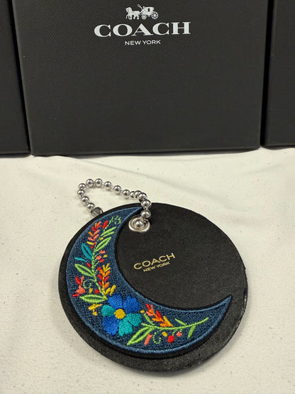 Repurposed Center of a Coach Coaster Holder with Embroidered Moon Patch and Large Ball Chain