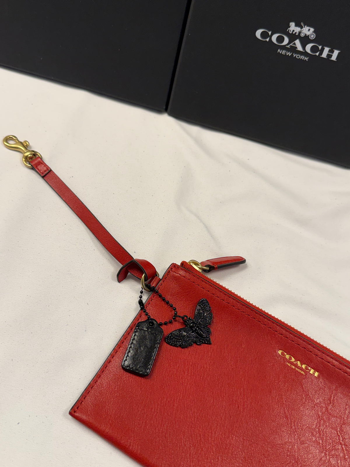 Upcrafted Coach Red Back Pouch with Gold Hardware Stenciled Skull Moth Painted and Mini Hagtag and Skull Moth Charm