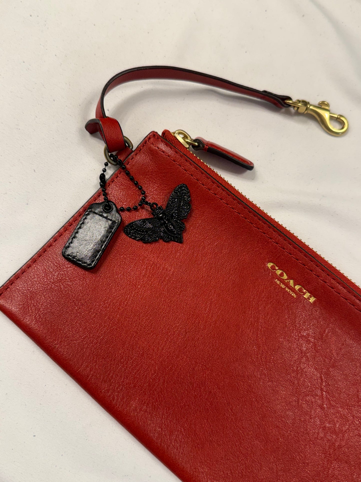 Upcrafted Coach Red Back Pouch with Gold Hardware Stenciled Skull Moth Painted and Mini Hagtag and Skull Moth Charm