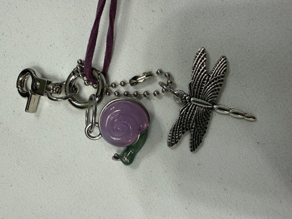 Repurposed Coach Lavender Snail Charm, Handcut Leather Purple Tassel, and Dragonfly Charm Bag Charm Cluster
