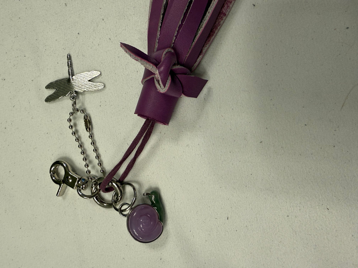 Repurposed Coach Lavender Snail Charm, Handcut Leather Purple Tassel, and Dragonfly Charm Bag Charm Cluster