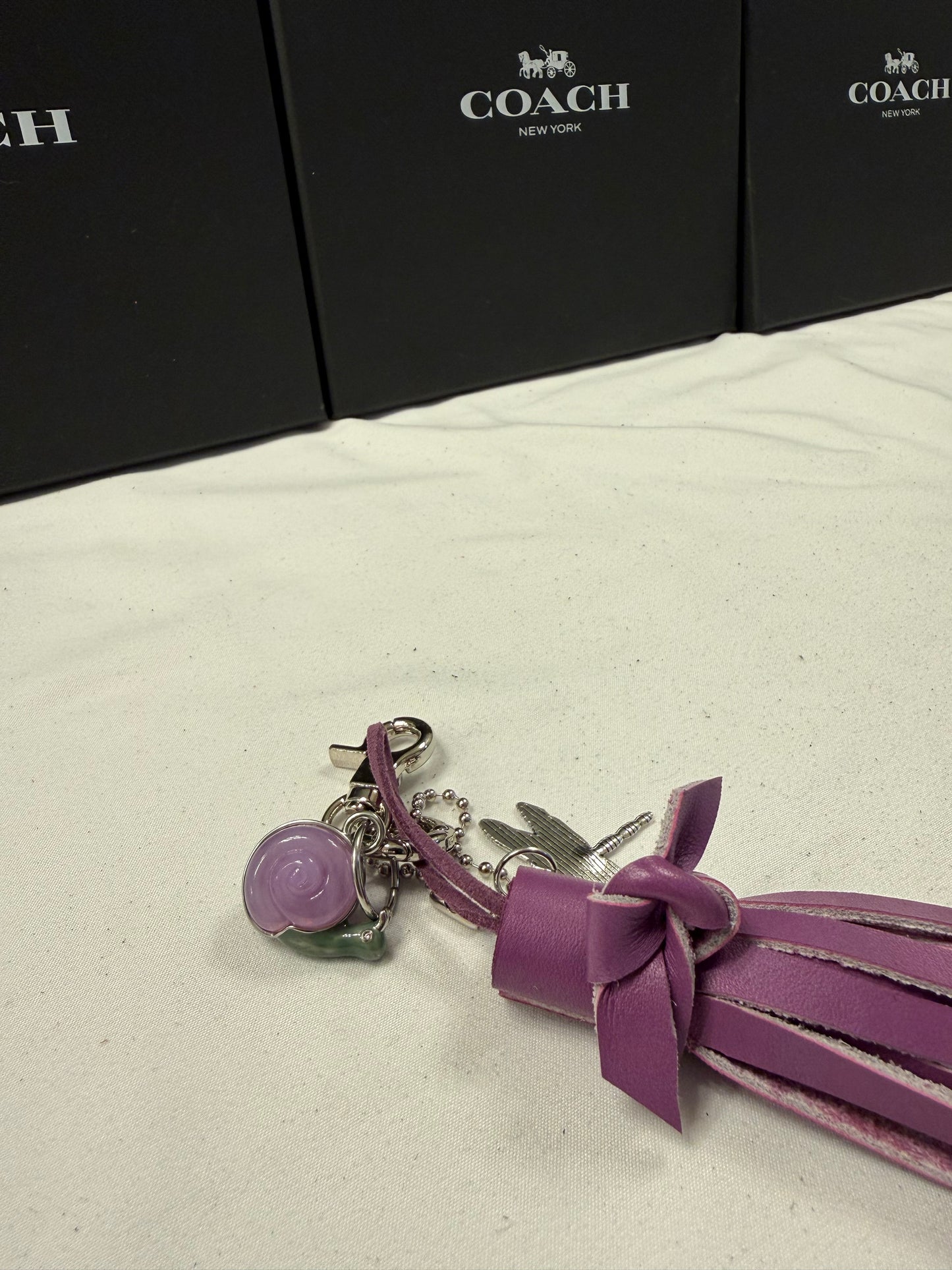 Repurposed Coach Lavender Snail Charm, Handcut Leather Purple Tassel, and Dragonfly Charm Bag Charm Cluster