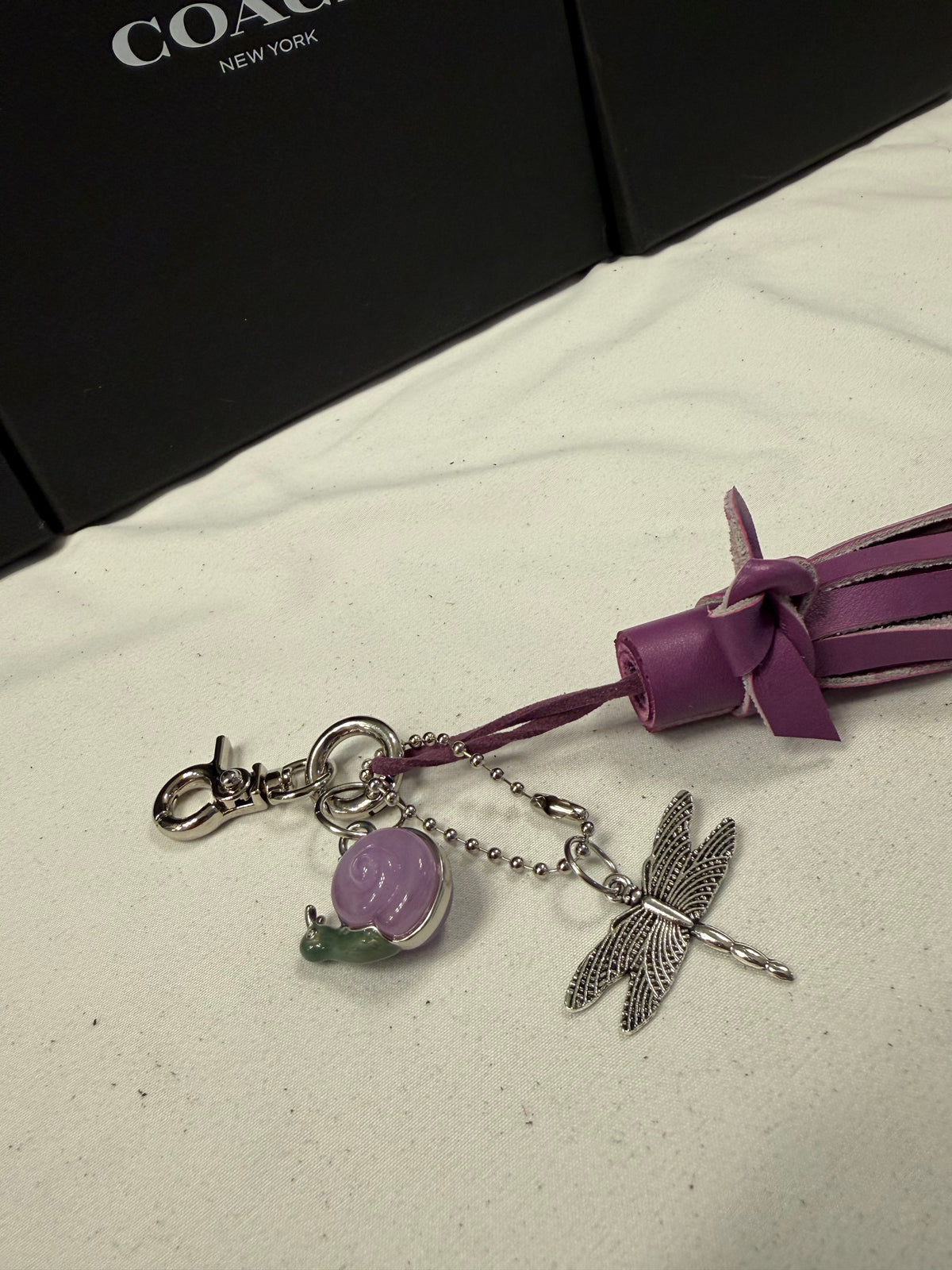 Repurposed Coach Lavender Snail Charm, Handcut Leather Purple Tassel, and Dragonfly Charm Bag Charm Cluster