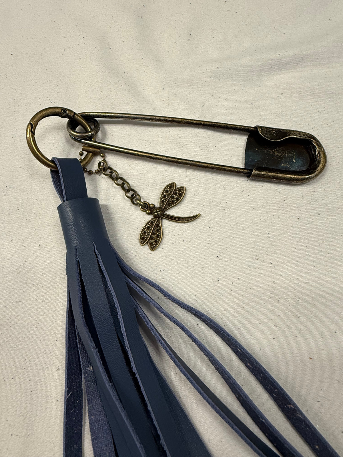 Handcut Blue Leather Tassel with XL Safety Pin and Dragonfly Charm Bag Charm