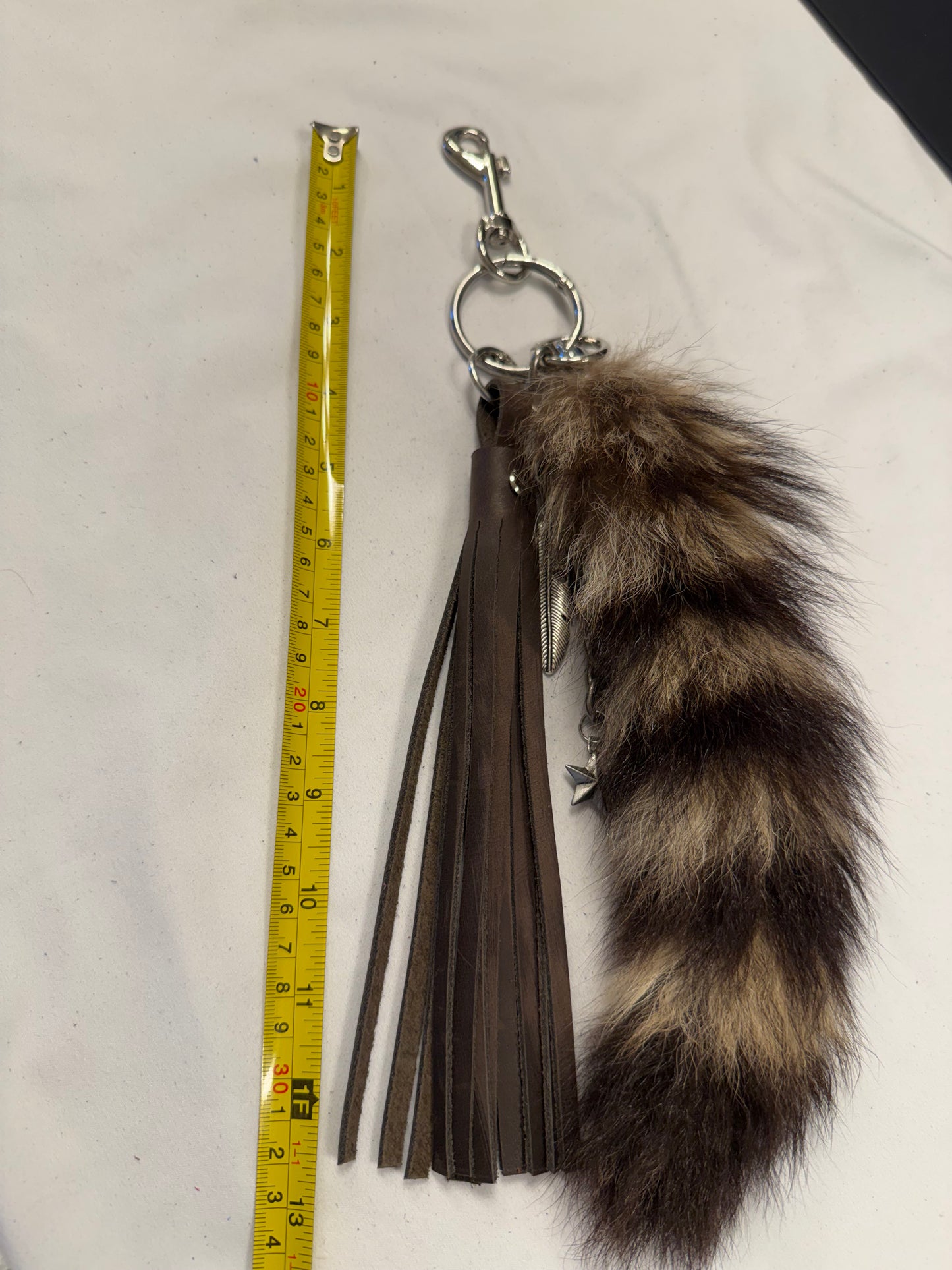 Cluster Bag Charm with Faux Fur Raccoon Tail, Handcut Leather Distressed Tassel, Gold Chain with Charms (the star is a Coach charm)