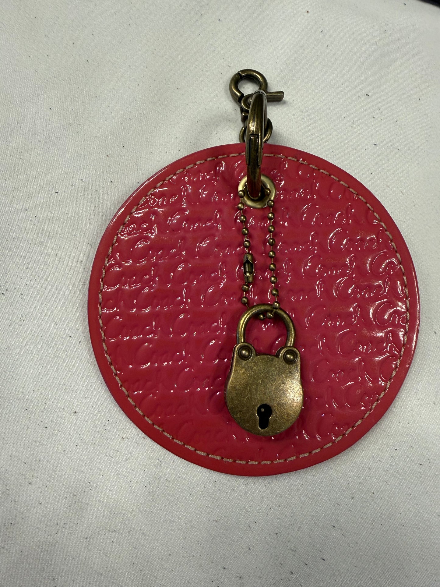 Repurposed Coach 1990s Coaster with Lock Bag Charm