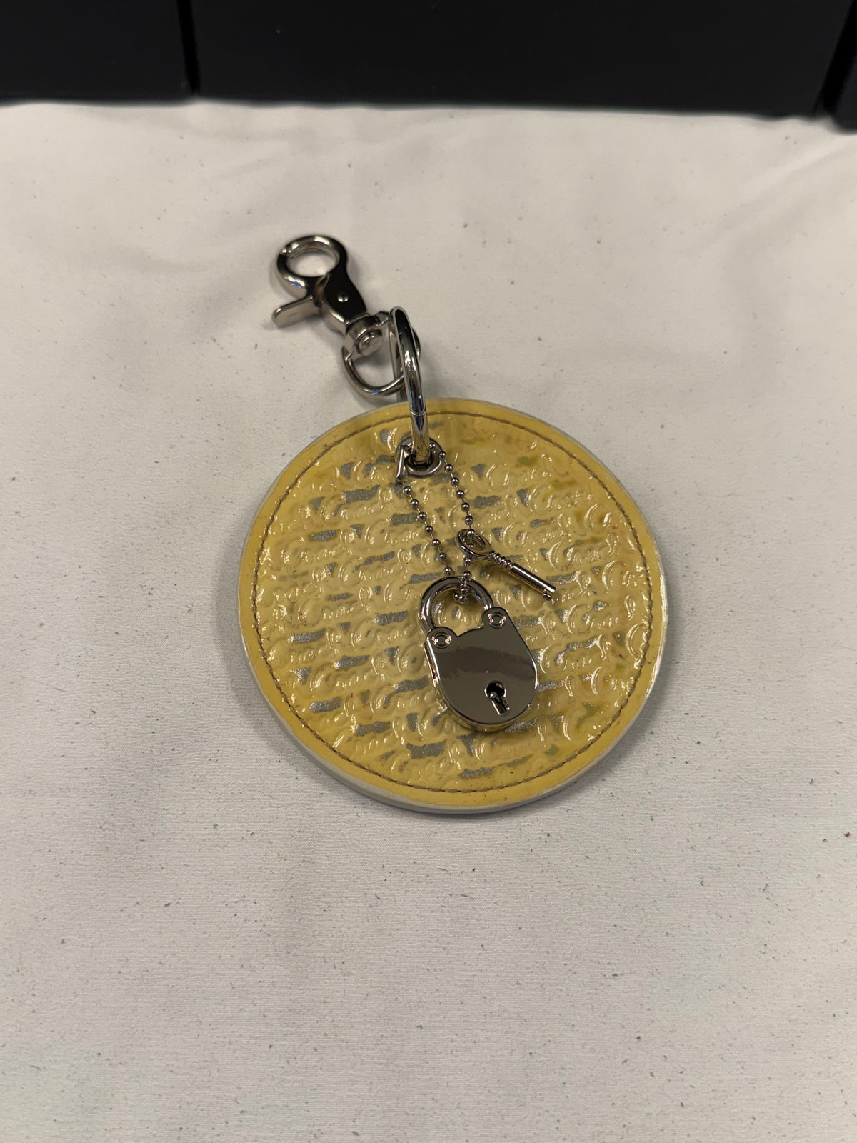 Repurposed Coach 1990s Coaster with Lock and Key Charm (works) Bag Charm