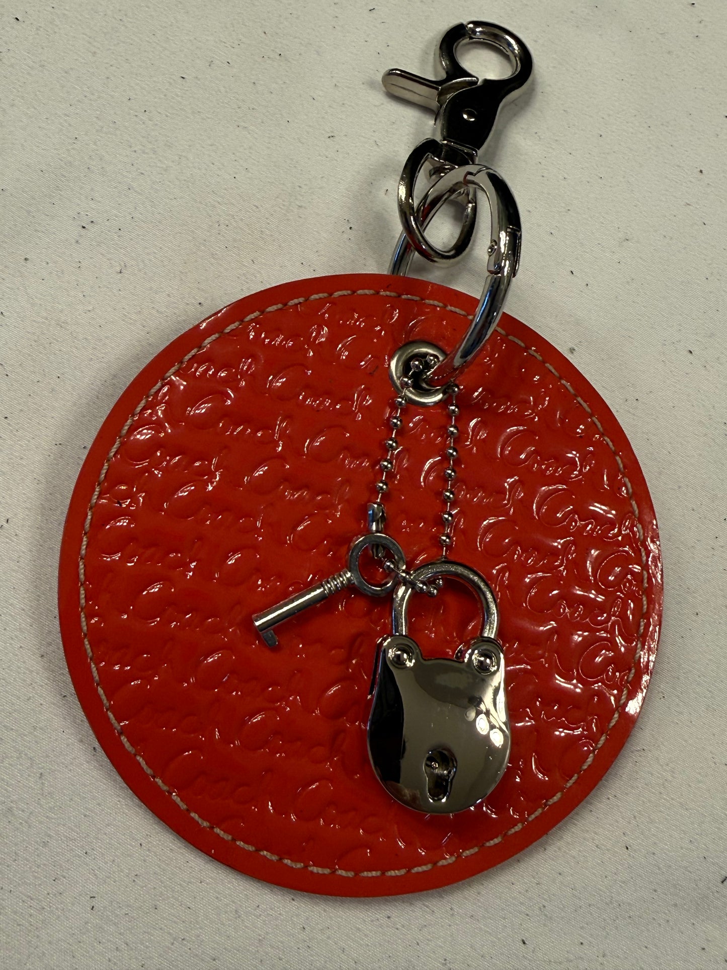 Repurposed 1990s Coach Coaster with Lock and Key (works) in Silver Tone