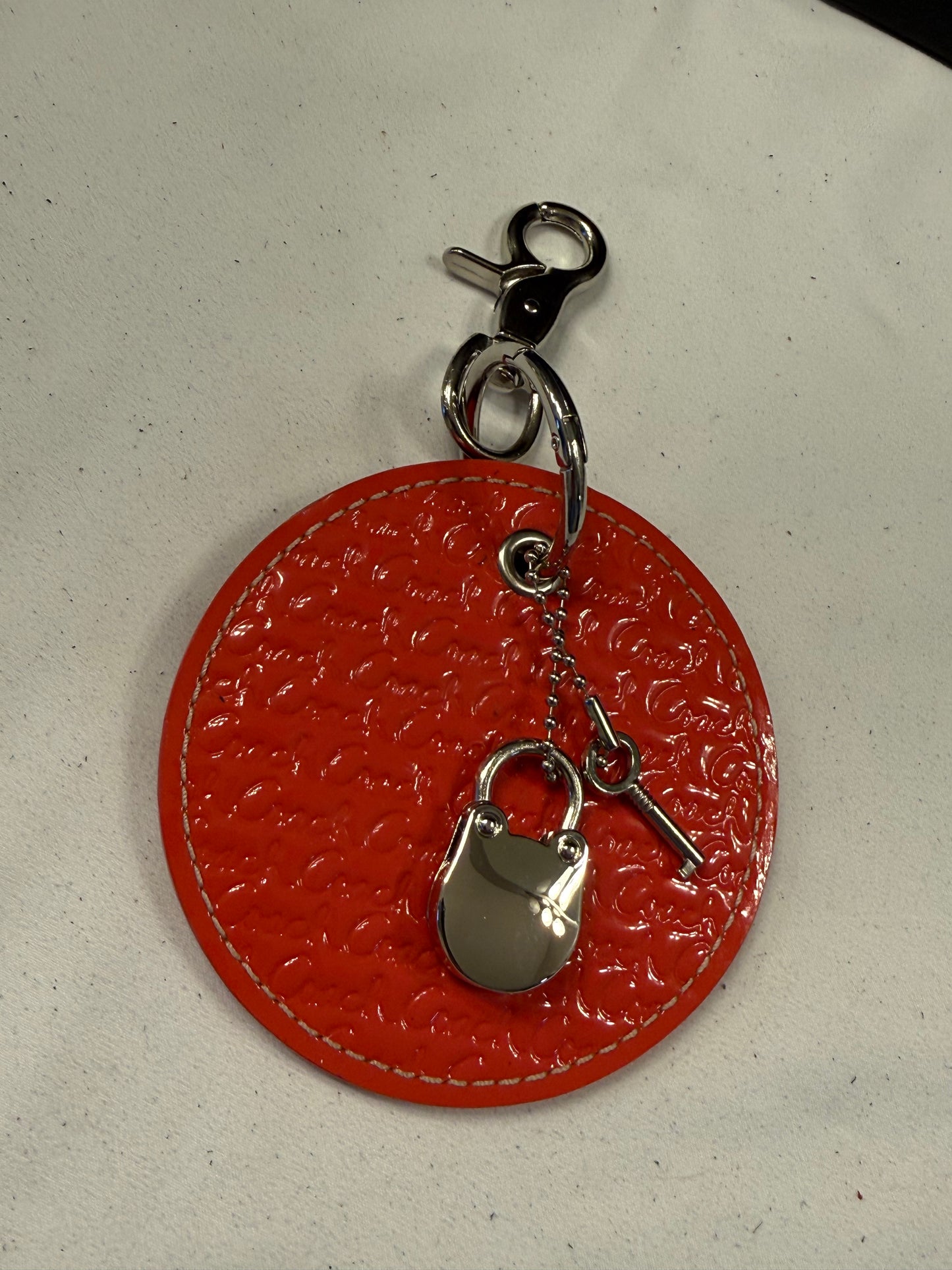 Repurposed 1990s Coach Coaster with Lock and Key (works) in Silver Tone