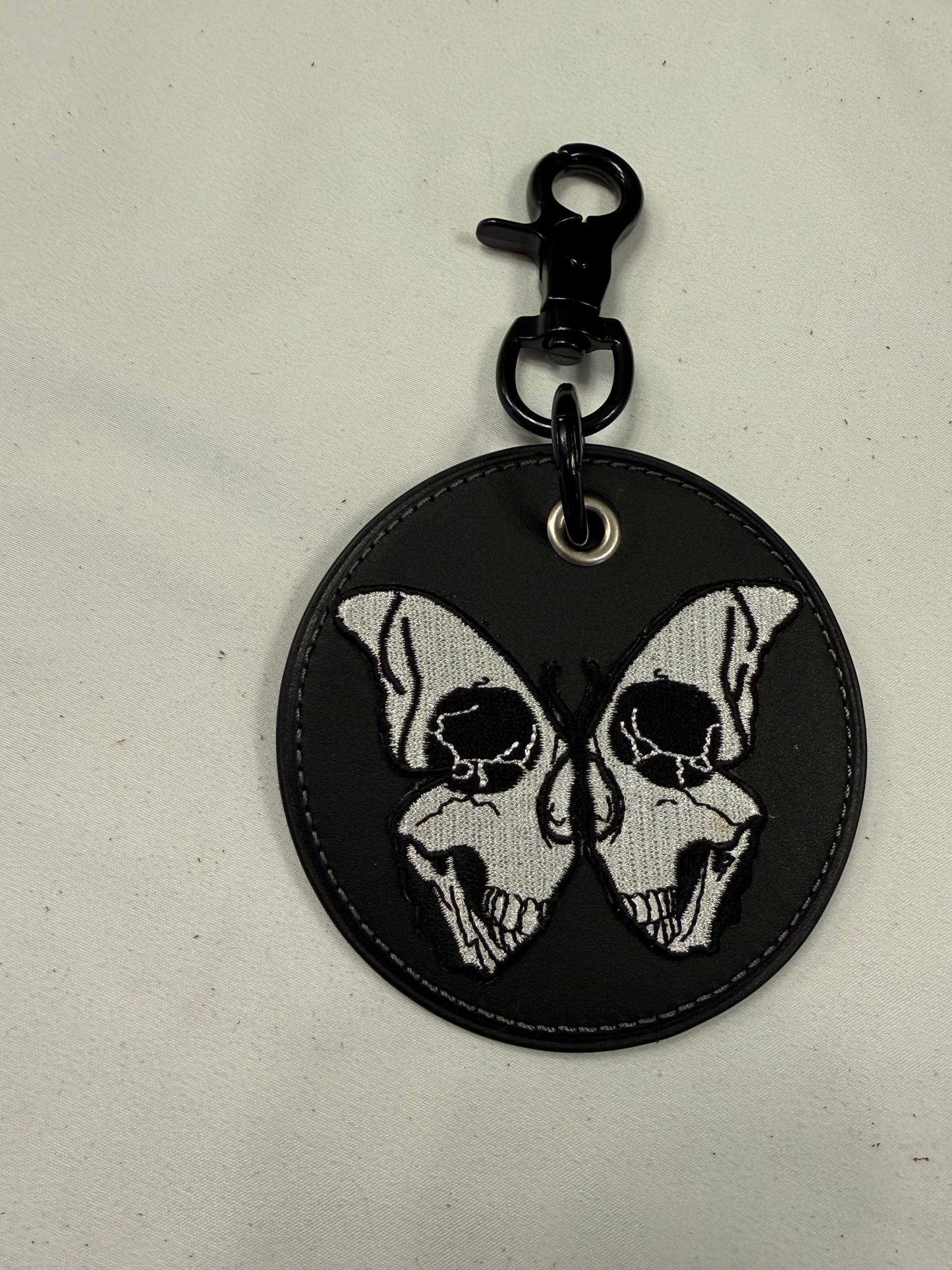 Repurposed Coach Coaster with Skull Butterfly Embroidered Patch Bag Charm Black Hardware