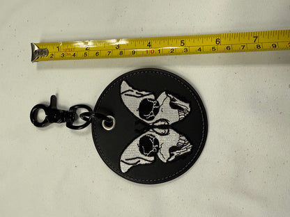 Repurposed Coach Coaster with Skull Butterfly Embroidered Patch Bag Charm Black Hardware