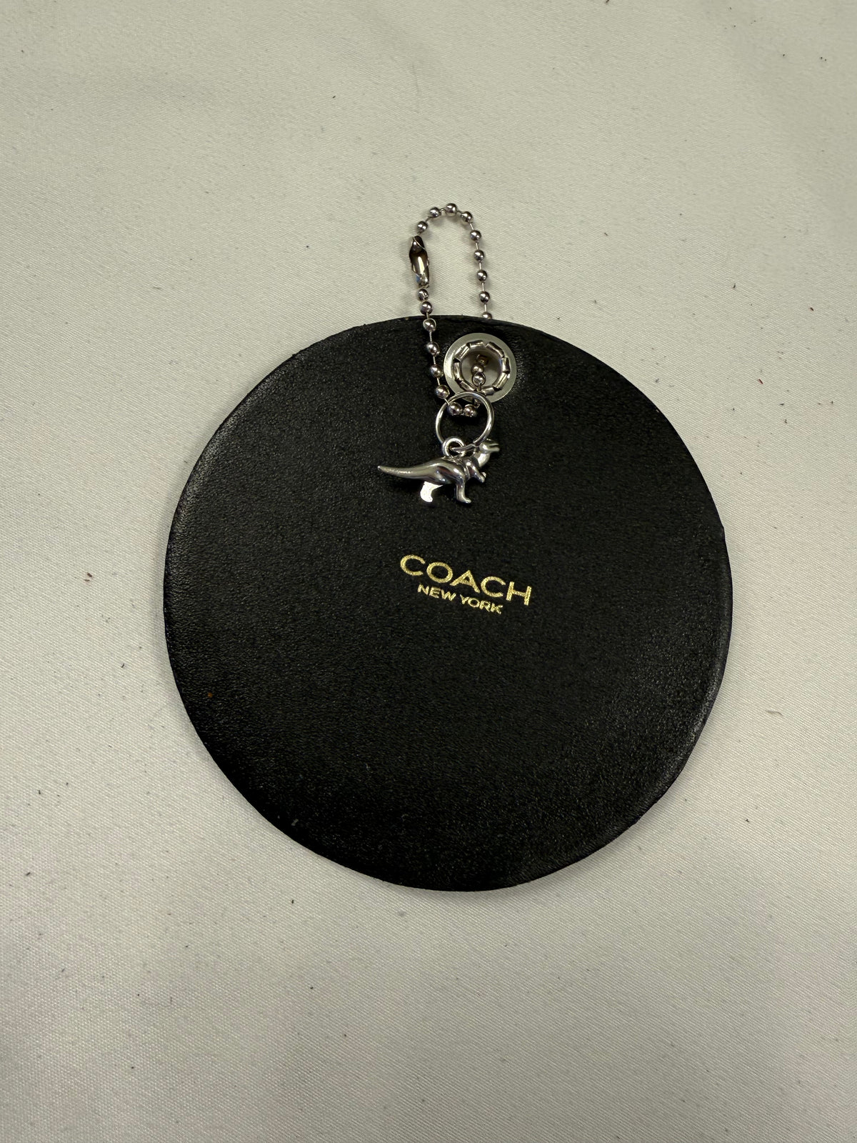 Repurposed Center of a Coach Coaster with T-Rex Embroidered Patch Bag Charm Silver Hardware