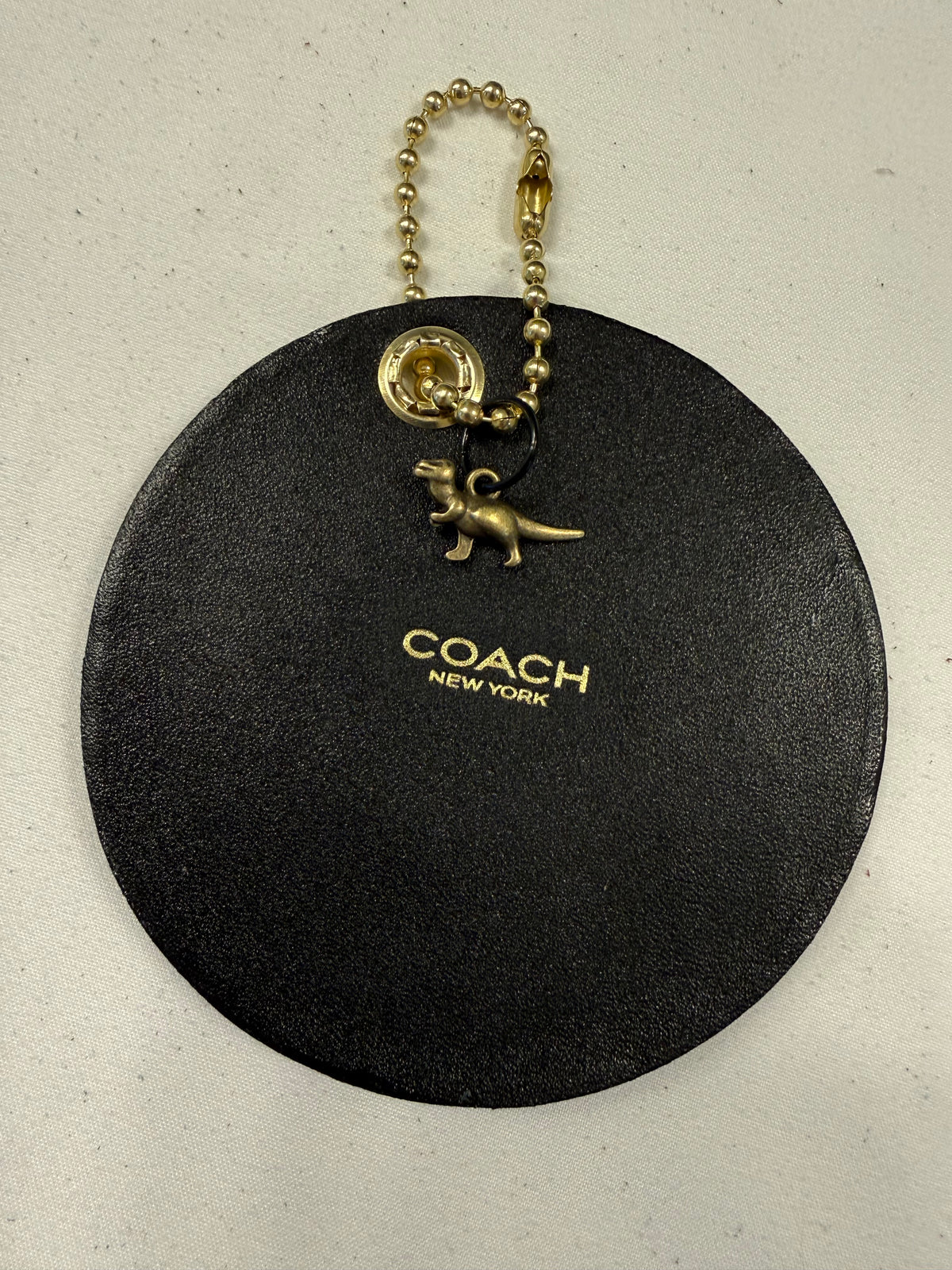 Repurposed Center of a Coach Coaster with Embroidered T-Rex Patch Bag Charm